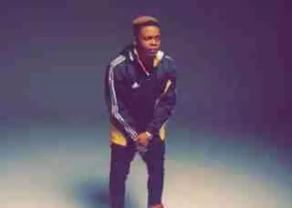 Olamide Proposes To His Baby Mama On Her Birthday